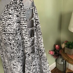 Jennifer Lopez blouse with open arm detail